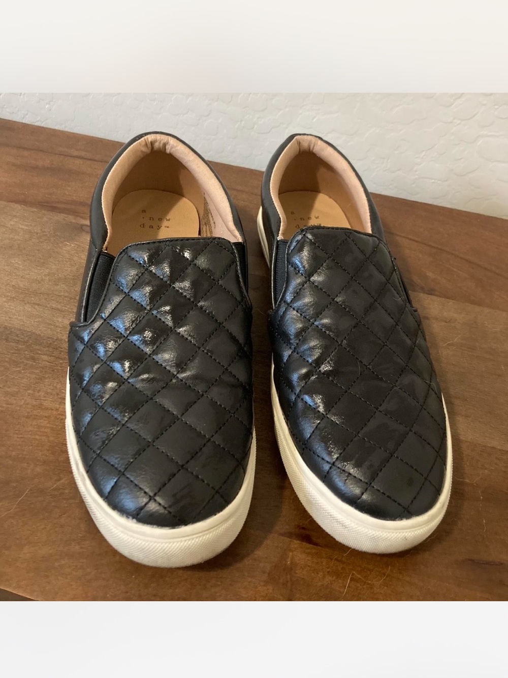 a new day Black Quilted Slip-On Sneakers with Cream Interior
